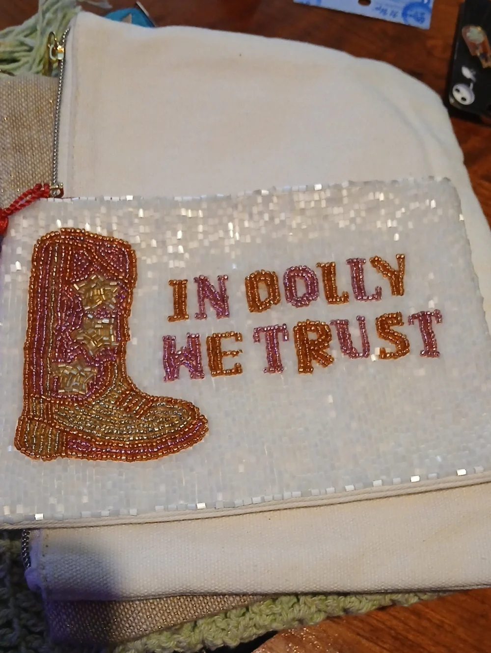 Beaded 'In Dolly We Trust' White Sequin Wristlet